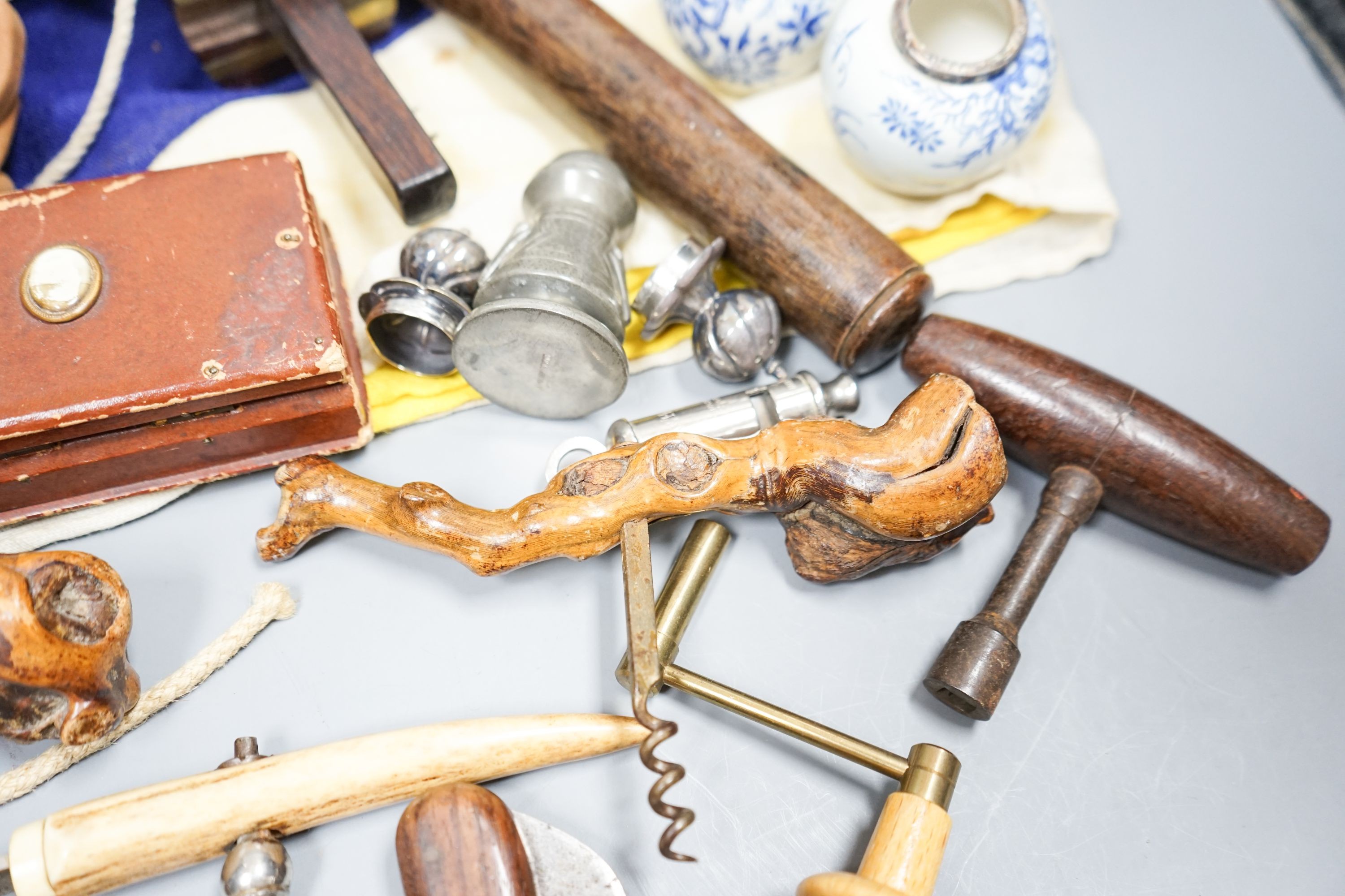 A carpenter's gauge stamped 'J. Waters', two rootwood-handled corkscrews, a Swiss clasp knife and sundry items